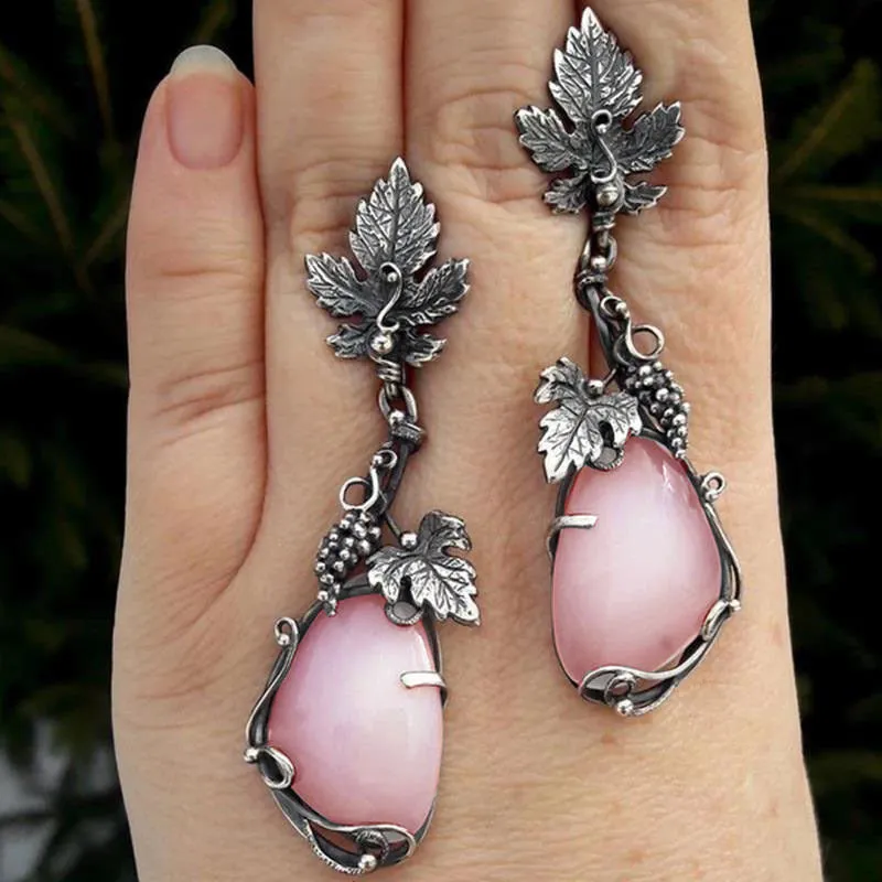 Wholesale Antique Silver Metal Vine Leaf Hand-inlaid White Teardrop-shaped Cat's Eye Earrings