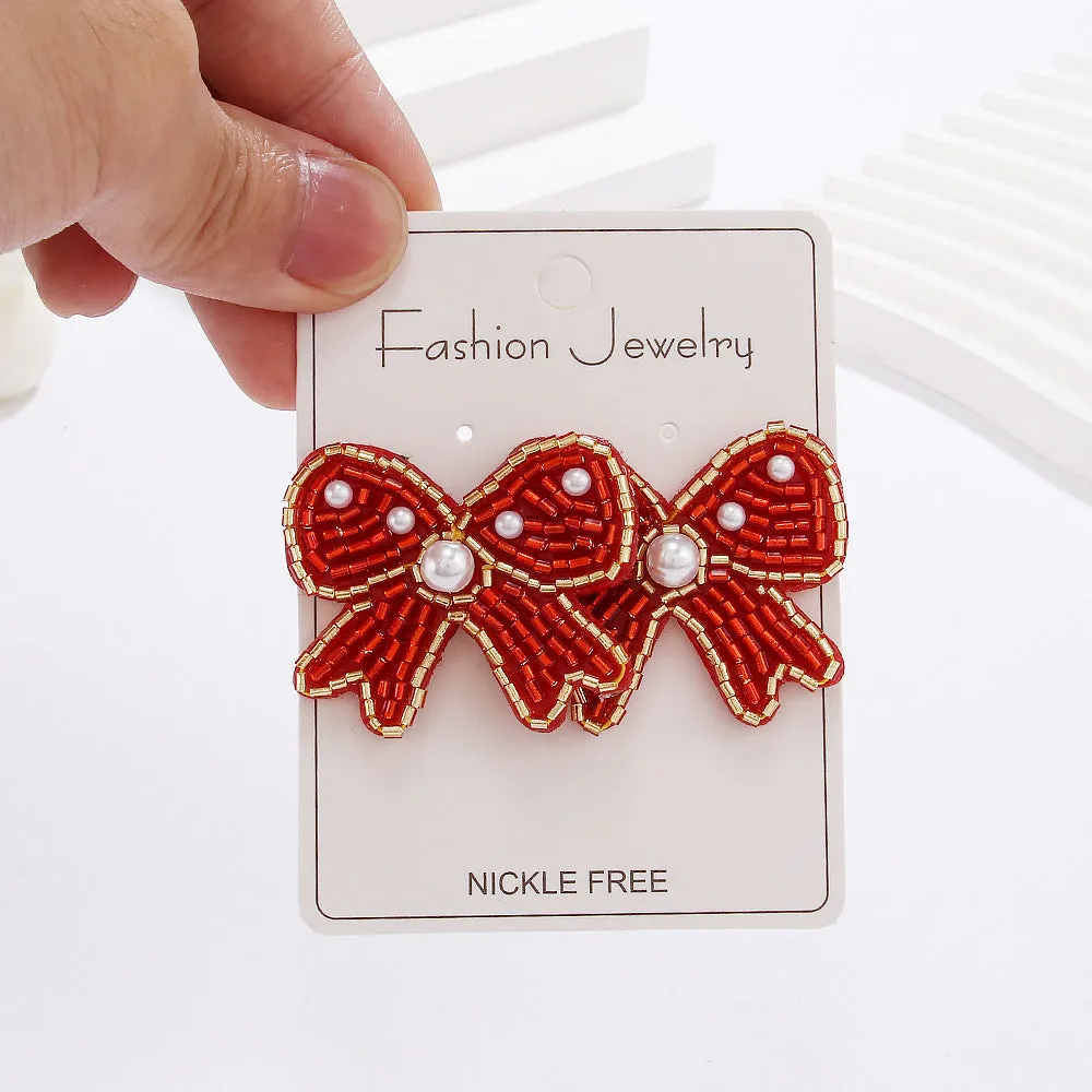 Wholesale Bohemian Holiday Style Bow Rice Beads Female Niche Versatile Simple Earrings