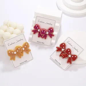 Wholesale Bohemian Holiday Style Bow Rice Beads Female Niche Versatile Simple Earrings