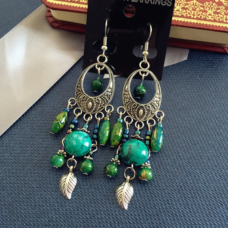 Wholesale Bohemian Retro Ethnic Style Ancient Silver Goddess Jewelry Face Skinny Tassel Long Earrings