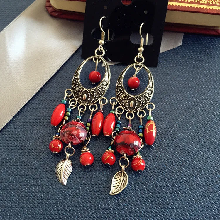 Wholesale Bohemian Retro Ethnic Style Ancient Silver Goddess Jewelry Face Skinny Tassel Long Earrings