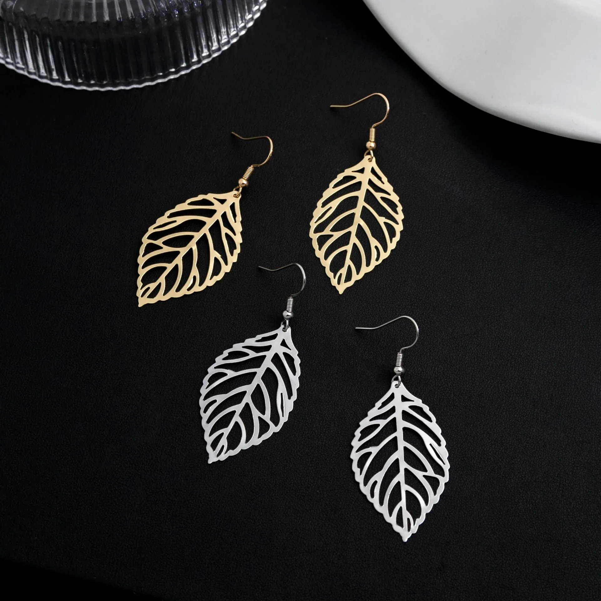 Wholesale Creative and simple forest style metal leaf earrings, ear studs and earrings