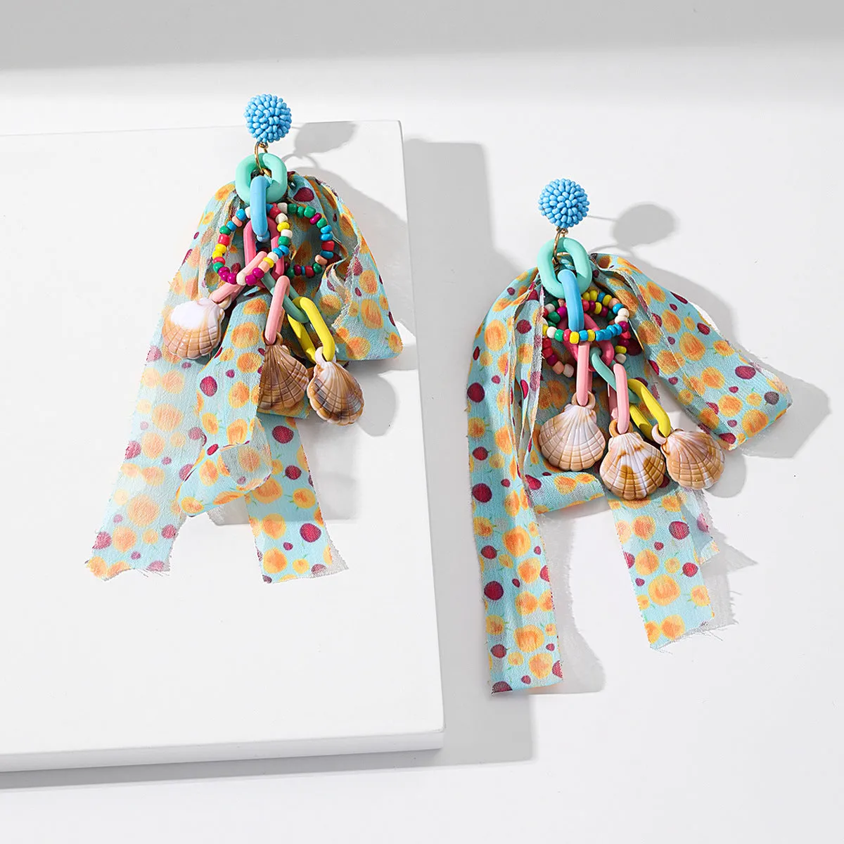 Wholesale Dopamine bow rice beads earrings sweet fashion atmosphere sense tassel earrings summer vacation wind earrings