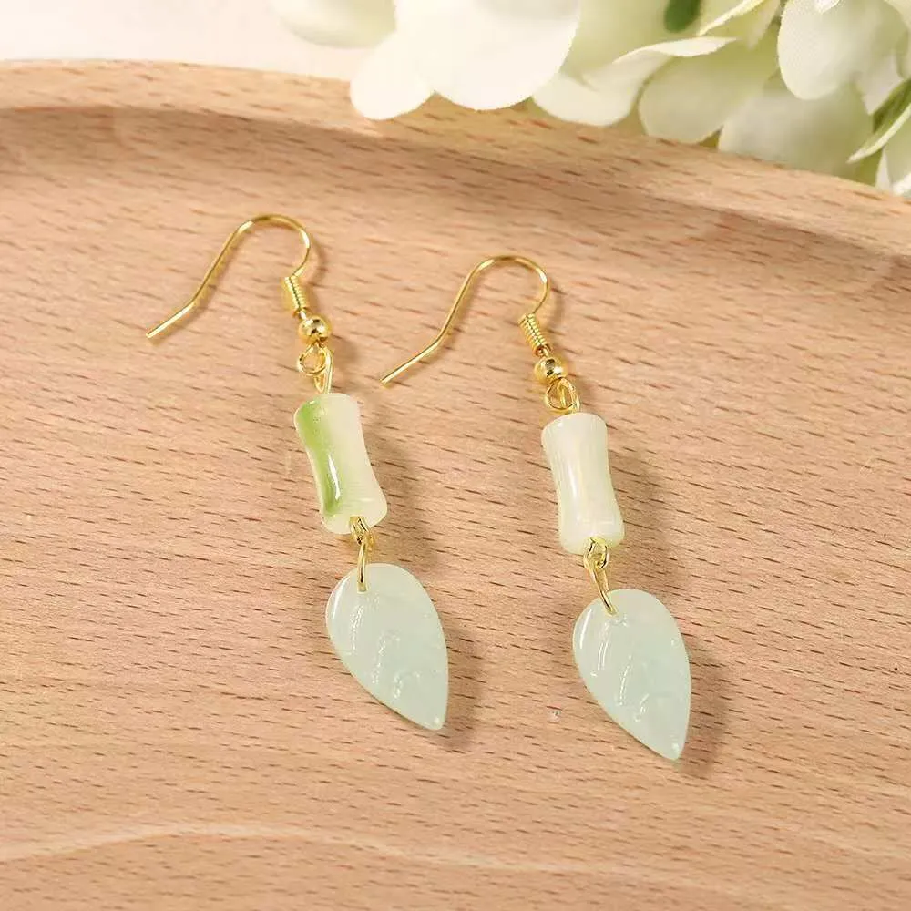 Wholesale Electroplated Ear Hook Long Gradient Bamboo Round Face Earrings