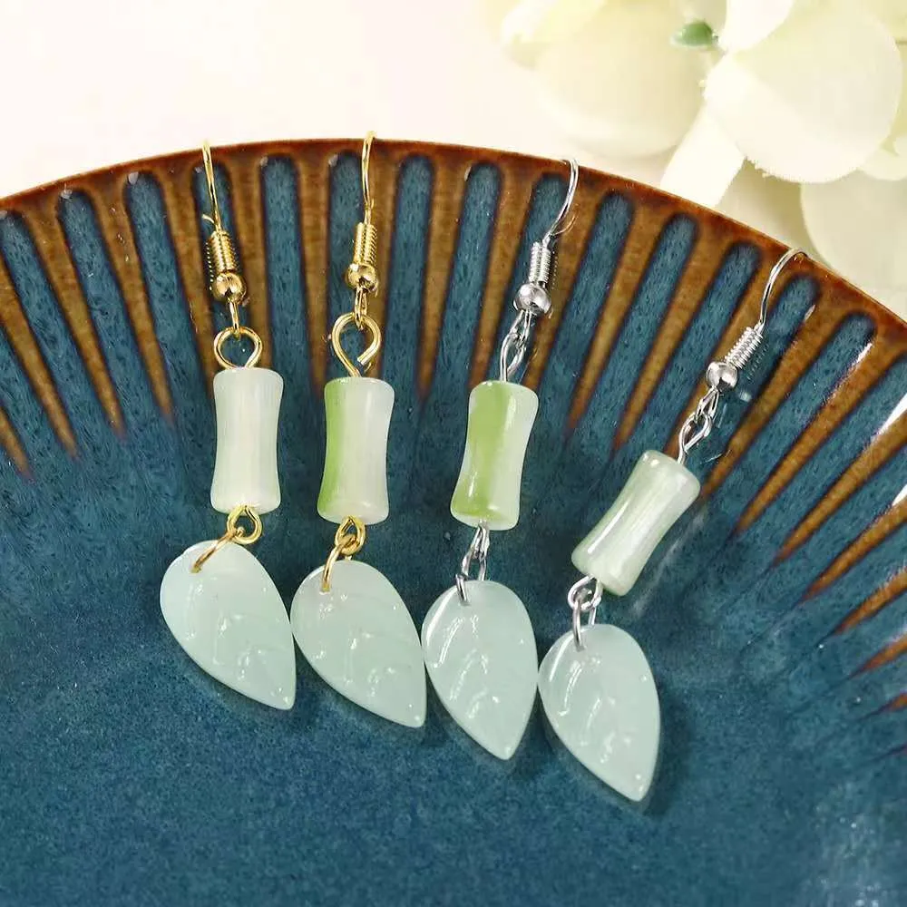 Wholesale Electroplated Ear Hook Long Gradient Bamboo Round Face Earrings