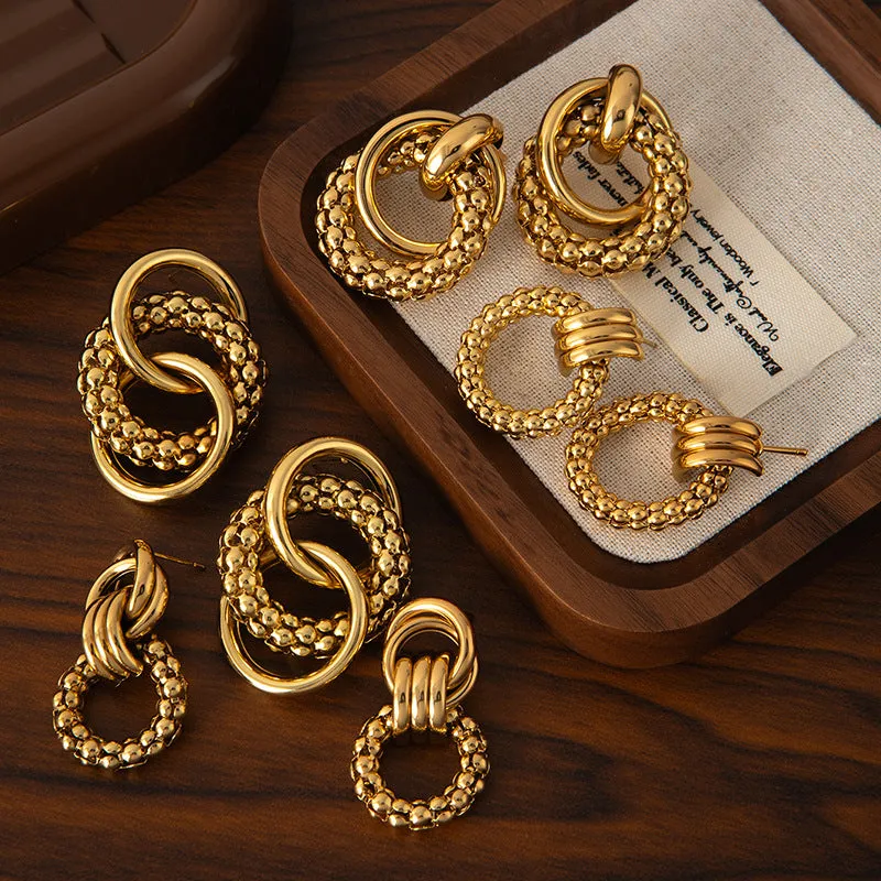 Wholesale Europe and the United States cross-border hot sale titanium steel solid smooth earrings high-end autumn and winter earrings light luxury niche female earrings earrings earbuckle