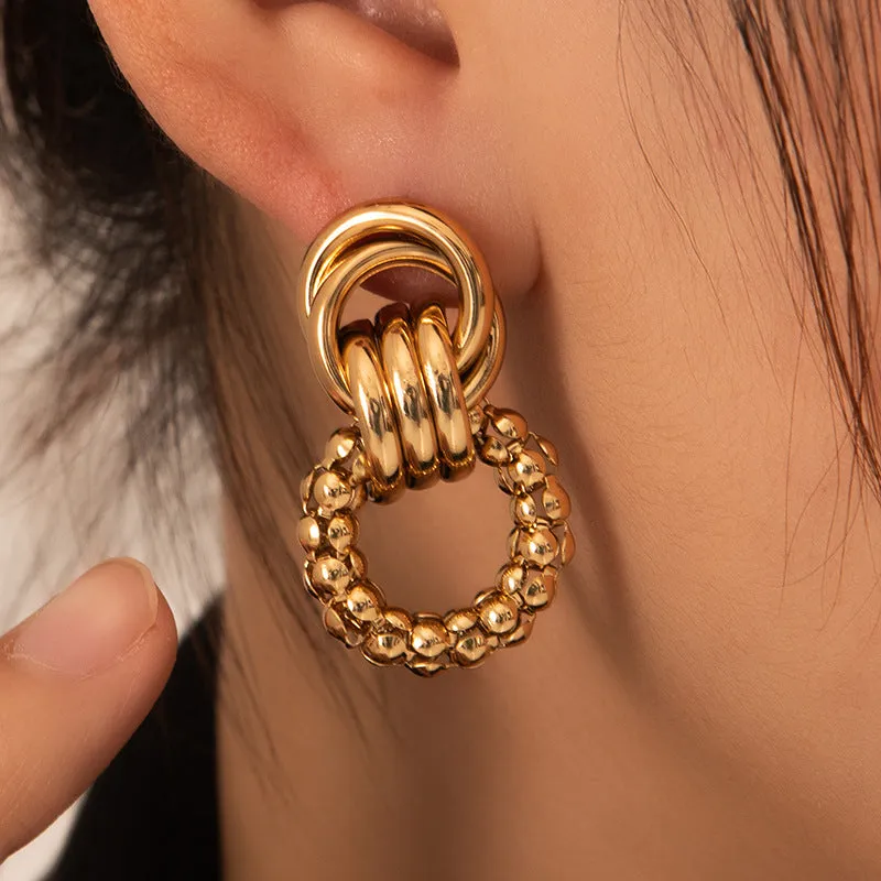 Wholesale Europe and the United States cross-border hot sale titanium steel solid smooth earrings high-end autumn and winter earrings light luxury niche female earrings earrings earbuckle