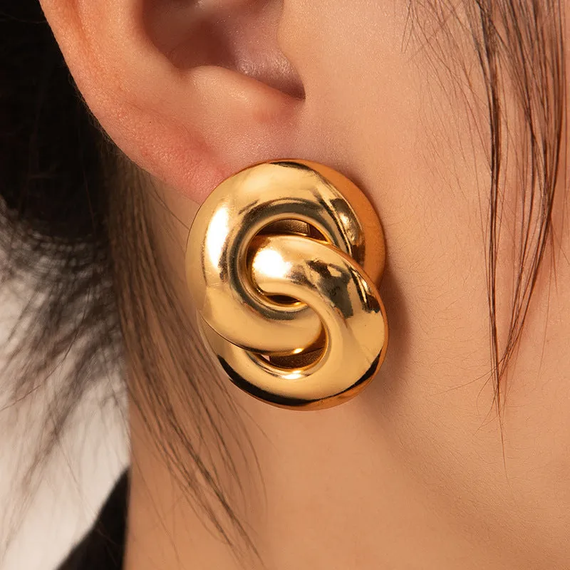 Wholesale Europe and the United States cross-border hot sale titanium steel solid smooth earrings high-end autumn and winter earrings light luxury niche female earrings earrings earbuckle