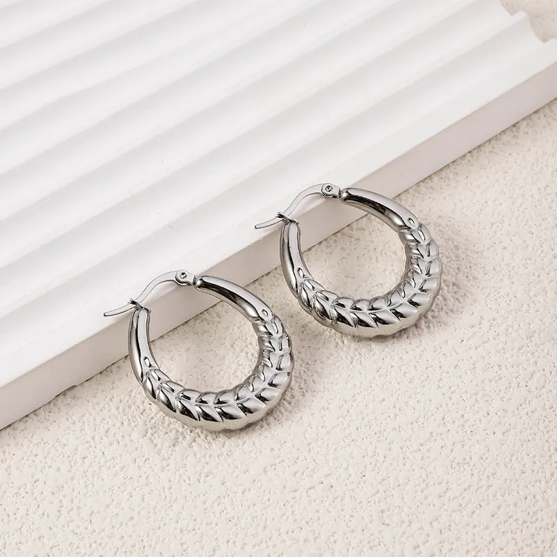 Wholesale High-end Oval Smooth Hollow Non Fading Irregular Decorated Titanium Steel Earrings
