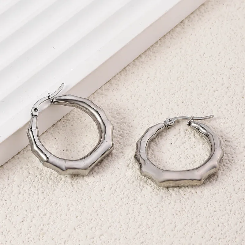 Wholesale High-end Oval Smooth Hollow Non Fading Irregular Decorated Titanium Steel Earrings