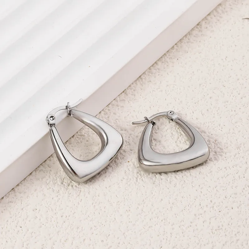 Wholesale High-end Oval Smooth Hollow Non Fading Irregular Decorated Titanium Steel Earrings