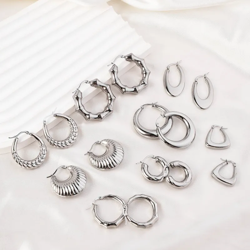 Wholesale High-end Oval Smooth Hollow Non Fading Irregular Decorated Titanium Steel Earrings