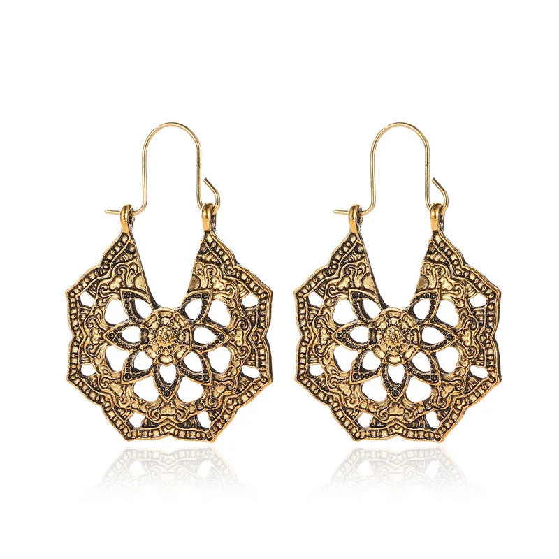 Wholesale Retro Metal Hollow Flower Bohemian Carved Court Style Earrings