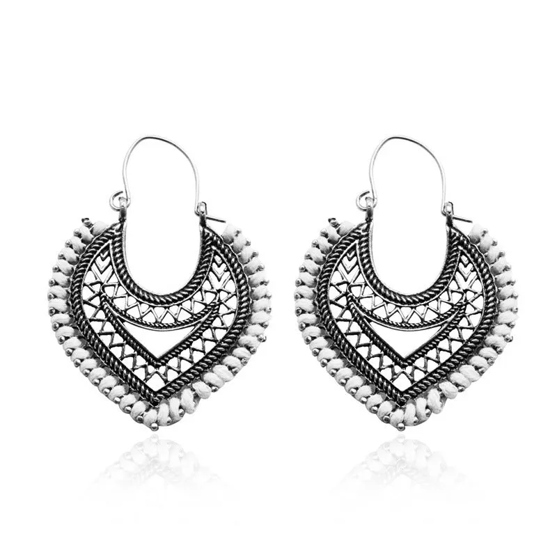 Wholesale Retro Metal Hollow Flower Bohemian Carved Court Style Earrings