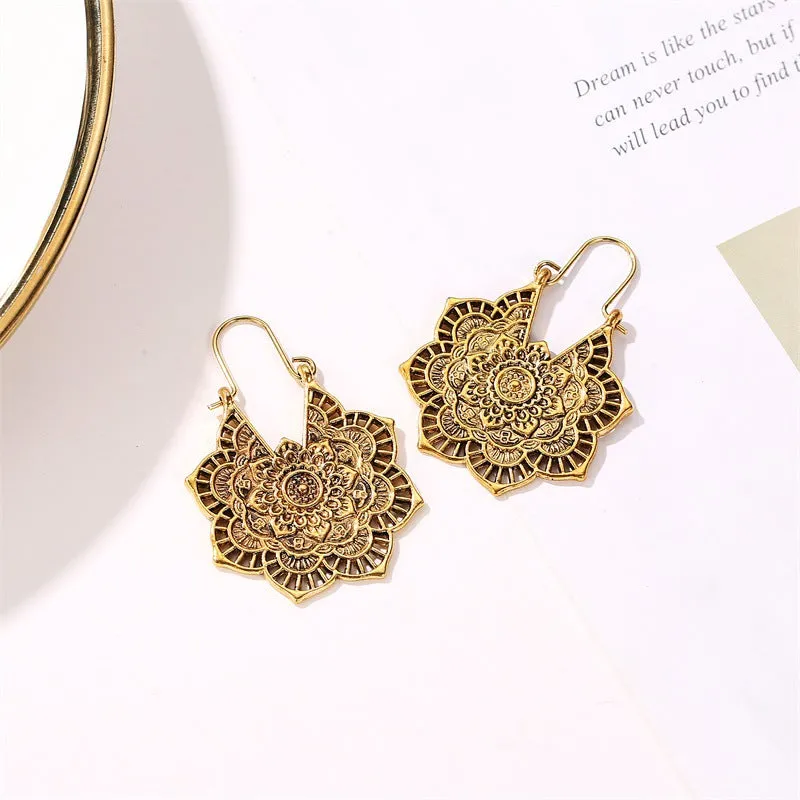 Wholesale Retro Metal Hollow Flower Bohemian Carved Court Style Earrings