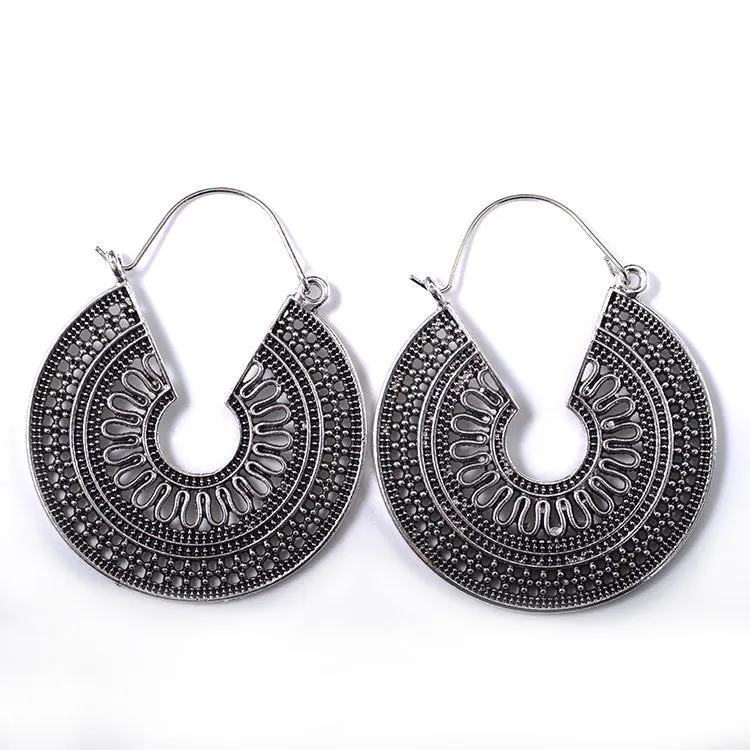 Wholesale Retro Metal Hollow Flower Bohemian Carved Court Style Earrings
