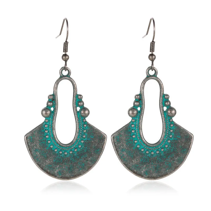 Wholesale Retro Metal Hollow Flower Bohemian Carved Court Style Earrings