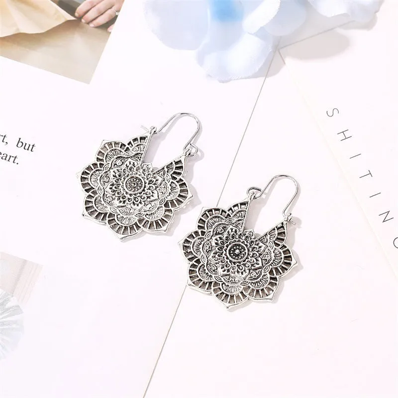 Wholesale Retro Metal Hollow Flower Bohemian Carved Court Style Earrings
