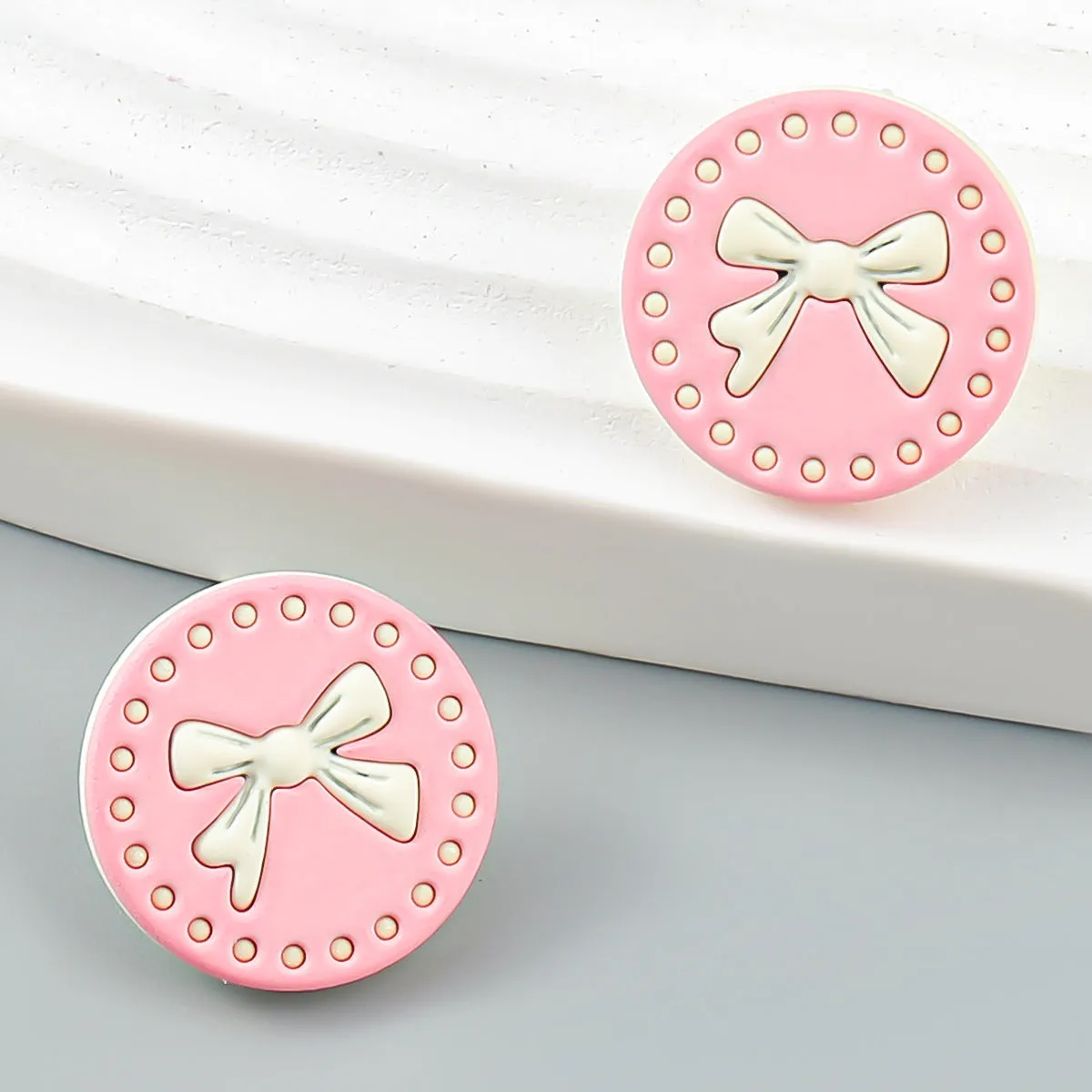 Wholesale Round Spray Painted Bow Alloy Ear Studs