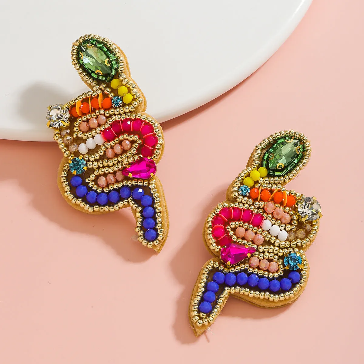 Wholesale snake-shaped hand-woven personalized colorful pearl earrings