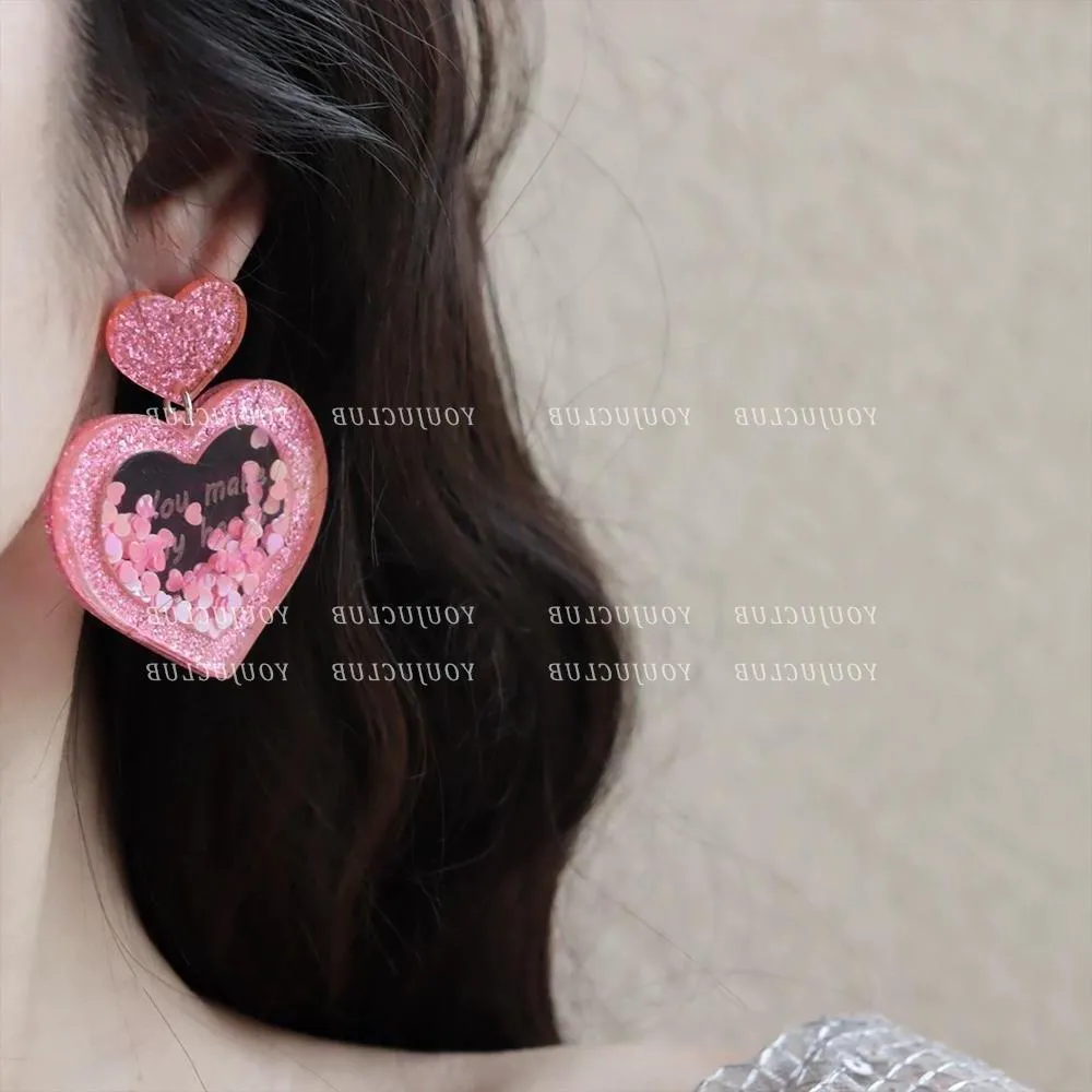Wholesale Valentine's Day love earrings acrylic three-dimensional sequins quicksand peach heart earrings sweet personality fashion retro
