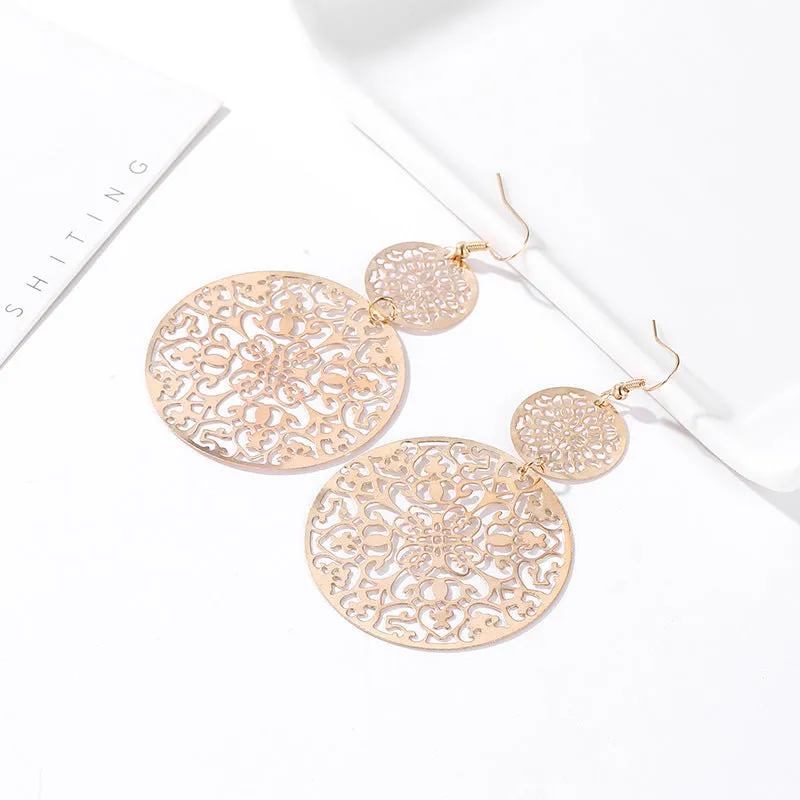 Wholesale Vintage Hollow Disc Frosted Palace Ethnic Style Carved Earrings