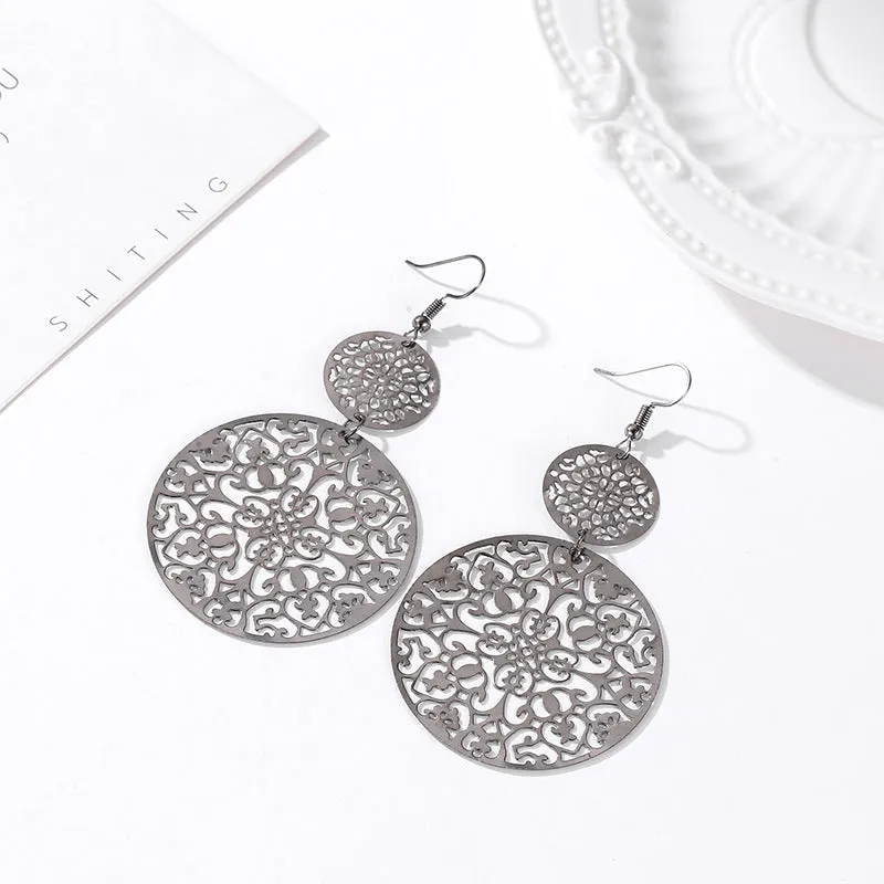 Wholesale Vintage Hollow Disc Frosted Palace Ethnic Style Carved Earrings