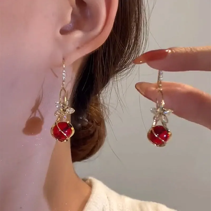 Wholesale Zircon Five Petal Flower Cat Eye Stone Personalized Fashion Temperament Earrings