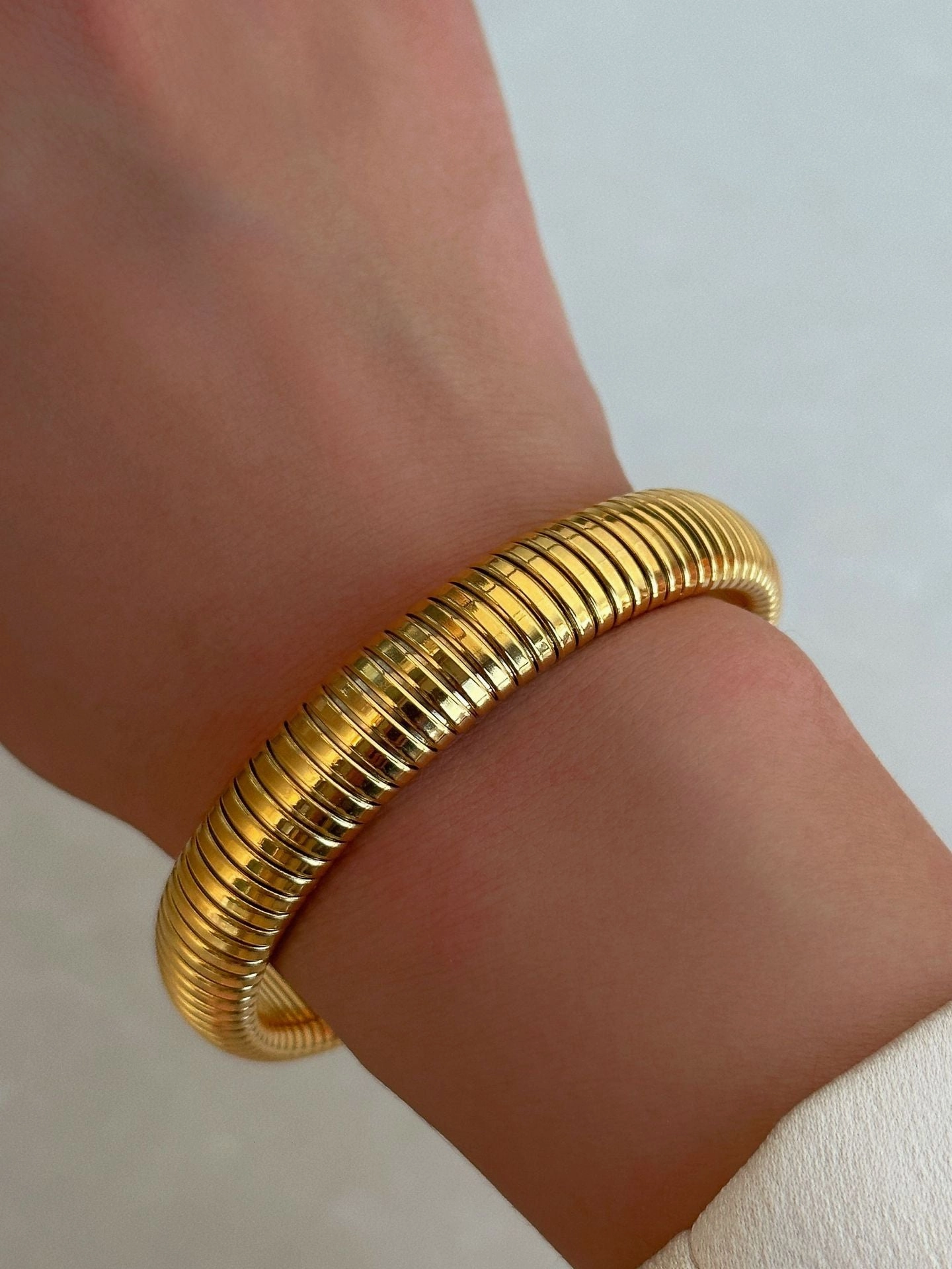 Wholesale 18k Real Gold Electroplated Titanium Steel Stretch Polished Bracelet