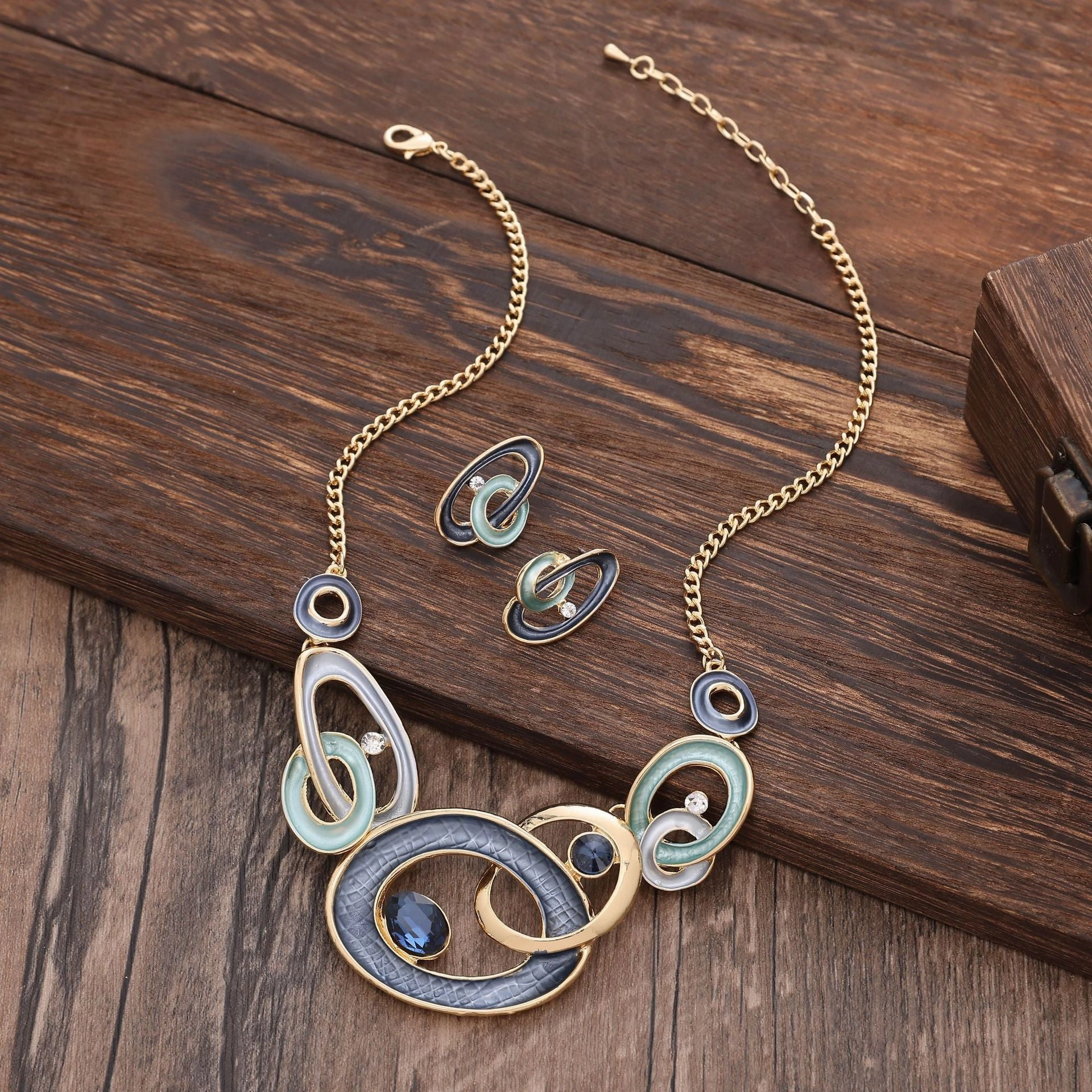 Wholesale 2pcs Popular Color Painting Oil Geometric Hollow Round Stud Earring Necklace Set