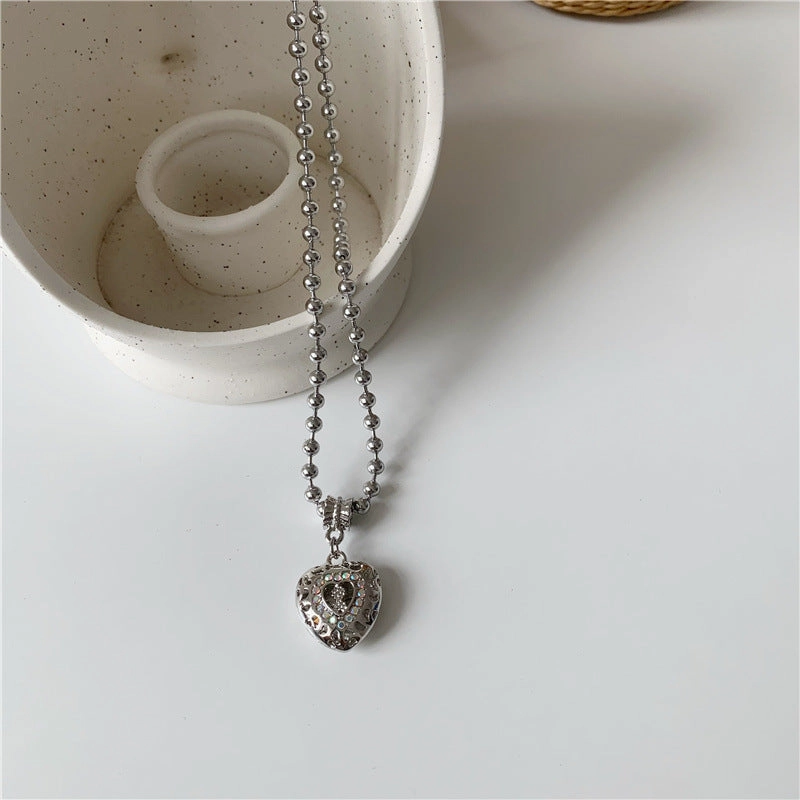 Wholesale Angel jelly love hollow diamond heart necklace titanium steel fashionable clavicle chain for women