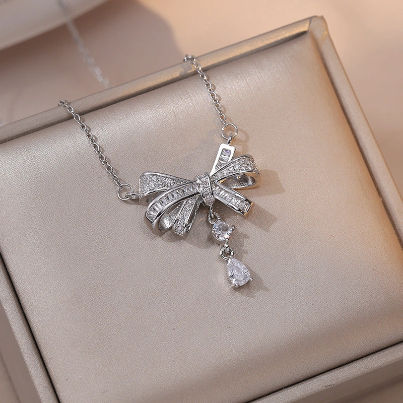 Wholesale Bowknot Phantom Water Drop Hollow Fan-shaped Diamond Pendant Clavicle Necklace