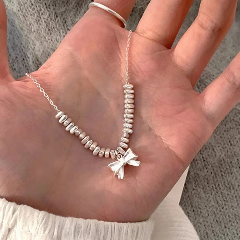 Wholesale broken silver bow necklace sweater chain copper necklace
