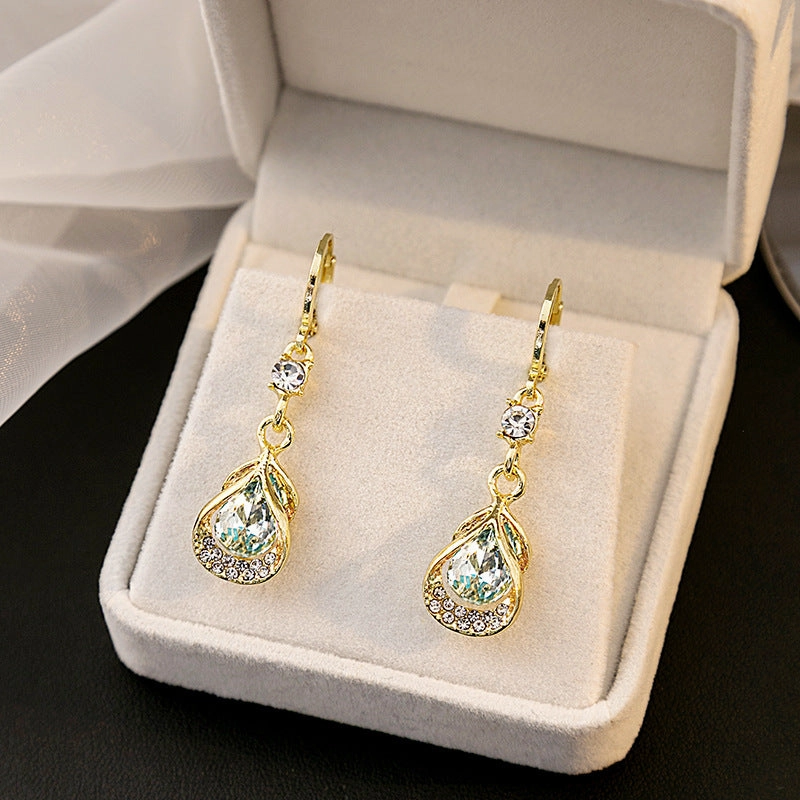 Wholesale Cat's Eye Stone Diamond Droplet Hollow Alloy Earrings