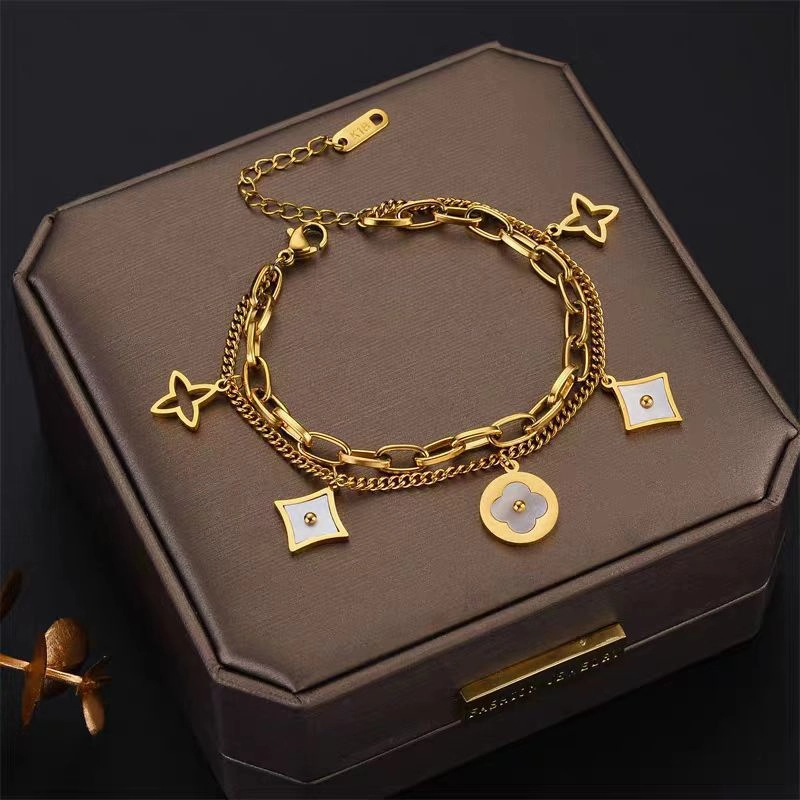 Wholesale Color-free Titanium Steel Golden Four-leaf Clover Fritillaria Bracelet OLY Exclusive