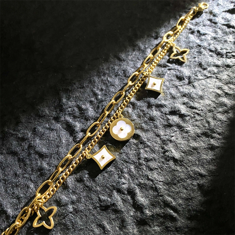Wholesale Color-free Titanium Steel Golden Four-leaf Clover Fritillaria Bracelet OLY Exclusive