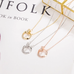 Wholesale Diamond-encrusted double-ring Mobius ring couple necklace for men and women light luxury niche high-end Valentine's Day gift