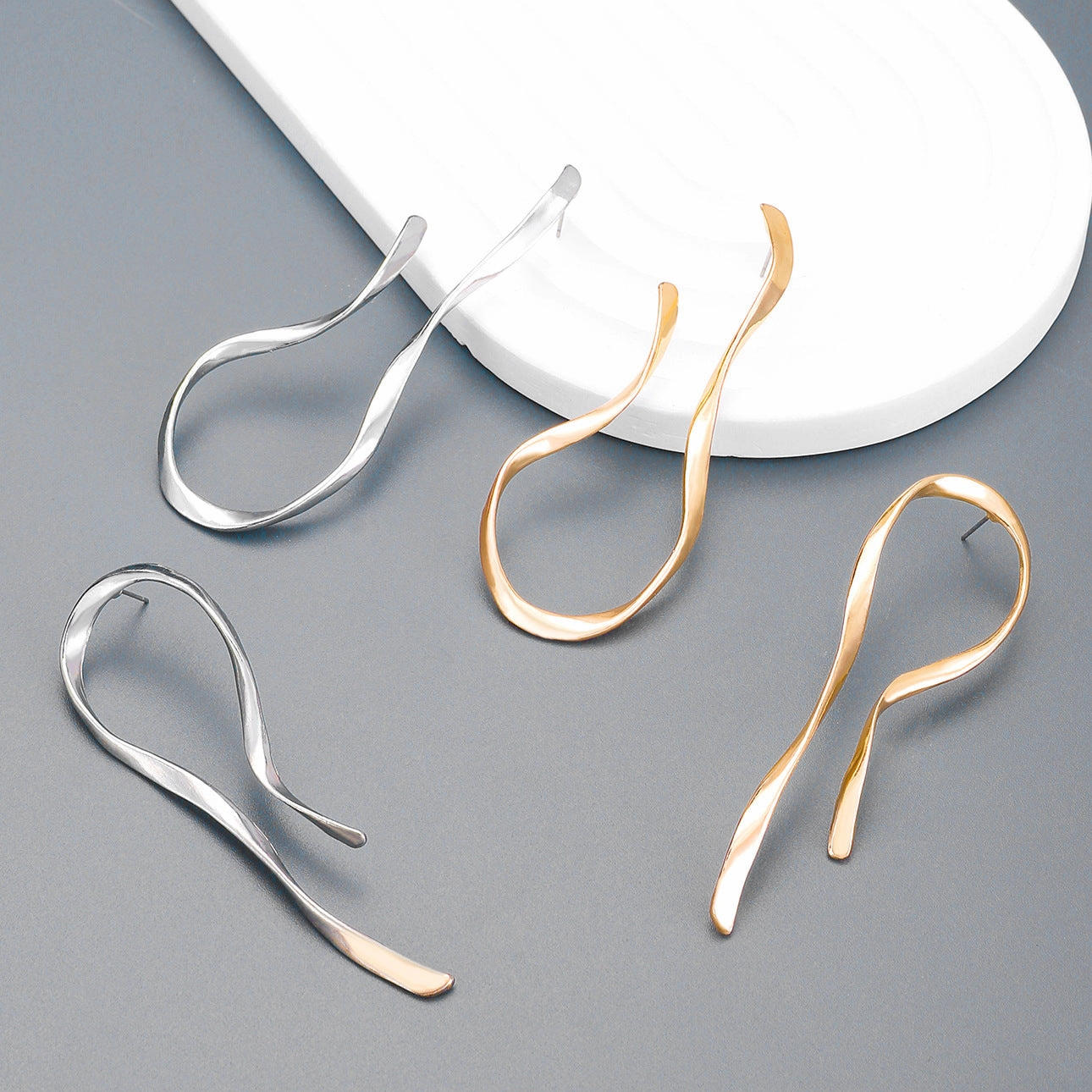 Wholesale Exaggerated Asymmetrical Linear Alloy Earrings