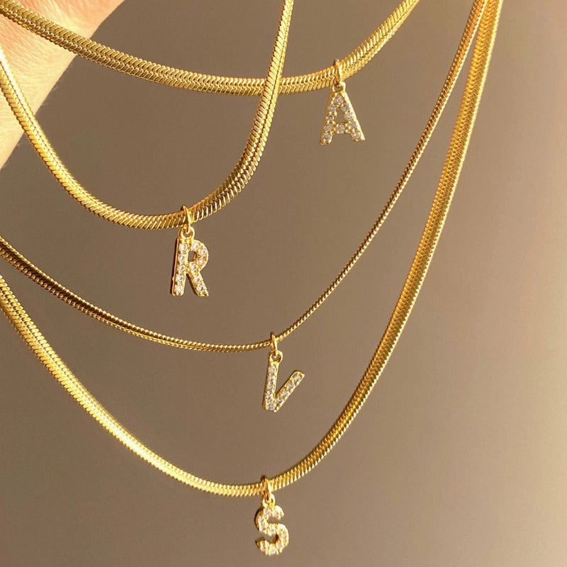 Wholesale French Retro Palace Style Flat Snake Bone Stacking Diamond 26 Letter Titanium Steel Clavicle Chain Necklace