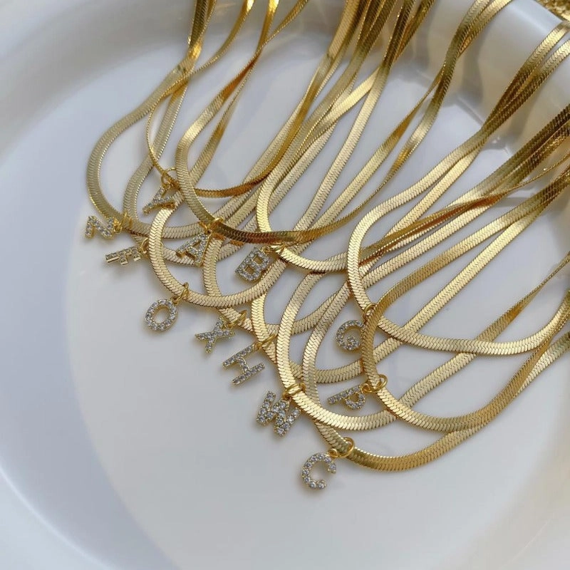 Wholesale French Retro Palace Style Flat Snake Bone Stacking Diamond 26 Letter Titanium Steel Clavicle Chain Necklace