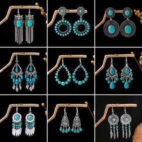 Wholesale Hollow Circular Flower Tassel Alloy Earrings