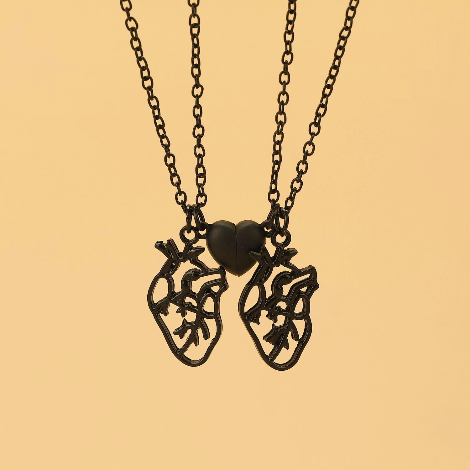 Wholesale hollow heart love magnetic unisex magnet couple necklace set