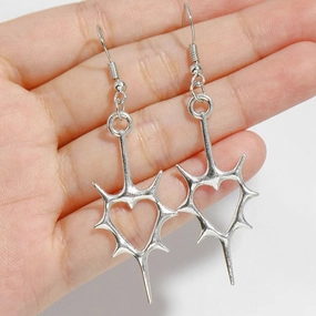 Wholesale Hollow pierced heart punk earrings