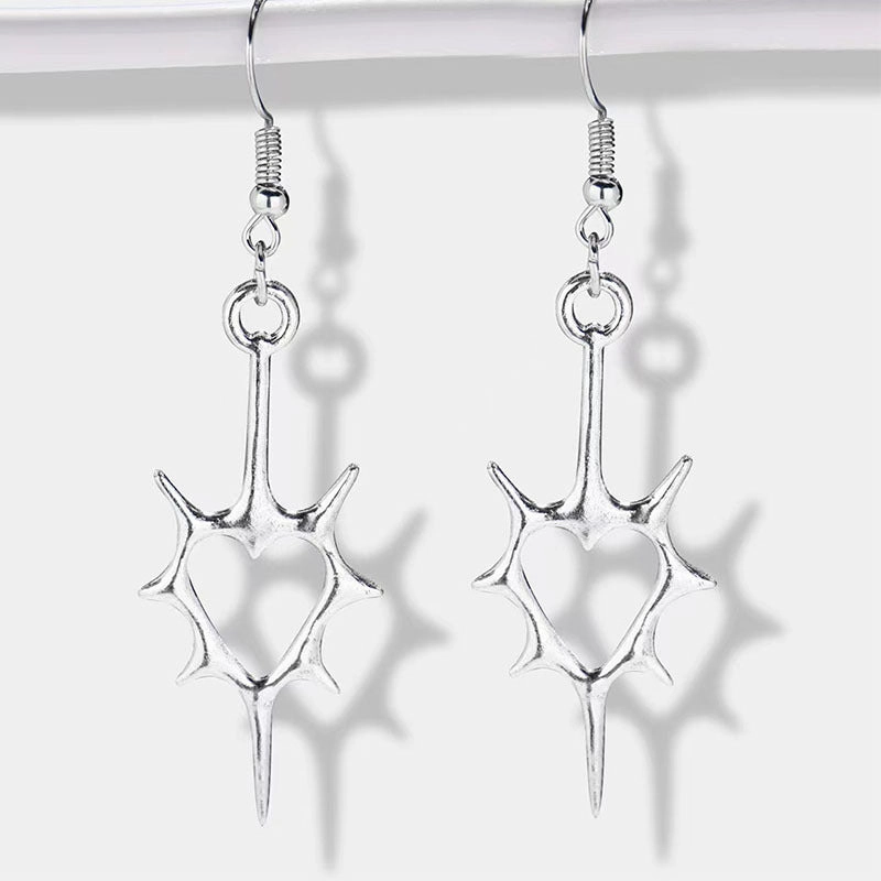 Wholesale Hollow pierced heart punk earrings