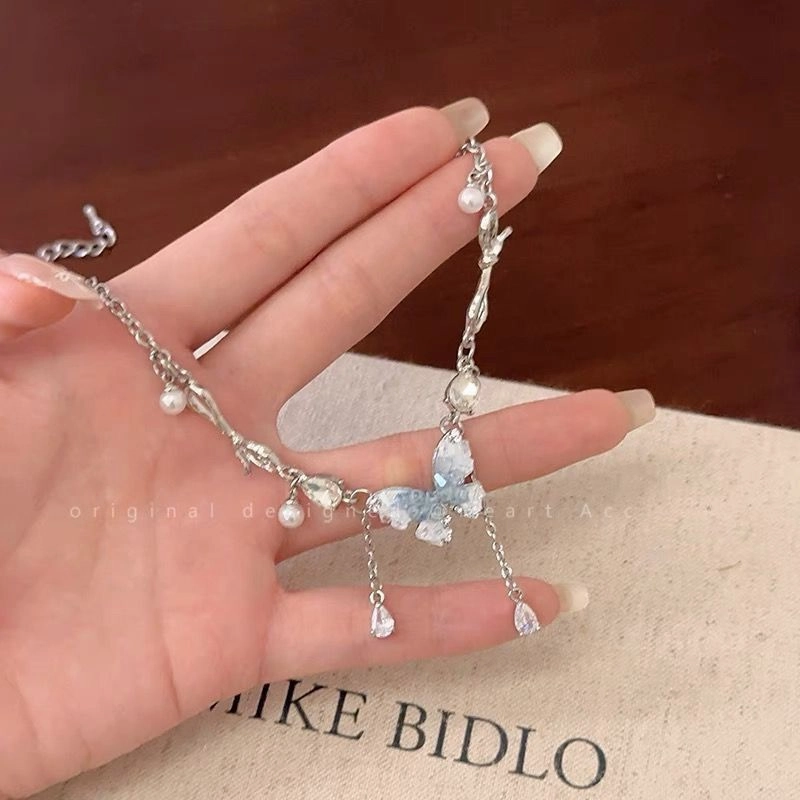 Wholesale Ice Crystal Gradient Pearl Butterfly Tassel Necklace Clavicle Chain