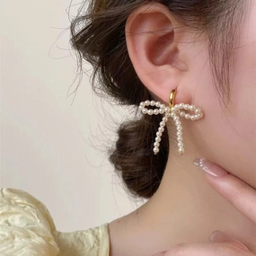 Wholesale Lady-style bow pearl earrings