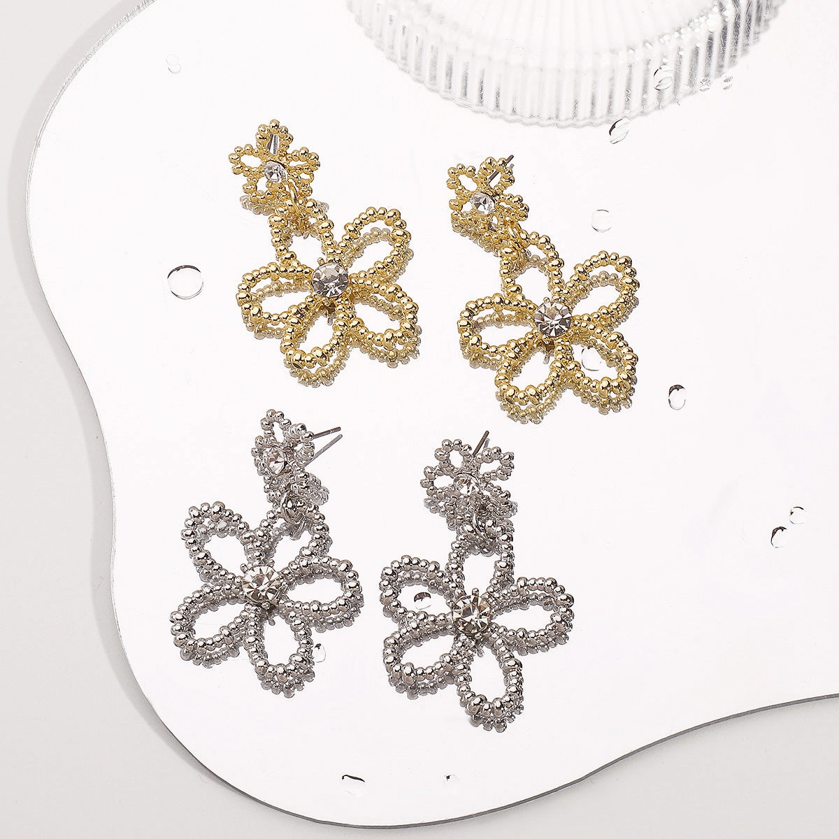 Wholesale metal-style geometric diamond earrings fresh and sweet hollow flowers earrings