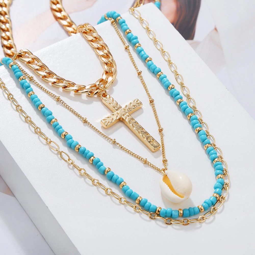 Wholesale Multi-Layered Demi Beads Shell Cross Necklace
