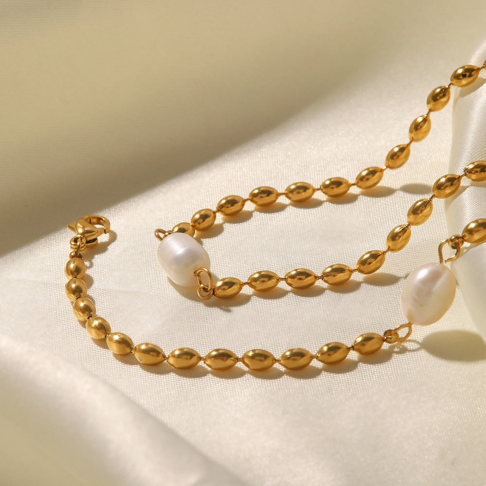 Wholesale Natural Freshwater Pearl Oval Golden Peas Titanium Steel Bracelet