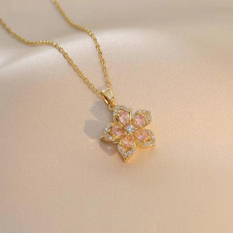 Wholesale Necklace rotating bauhinia zircon flower pendant temperament titanium steel necklace